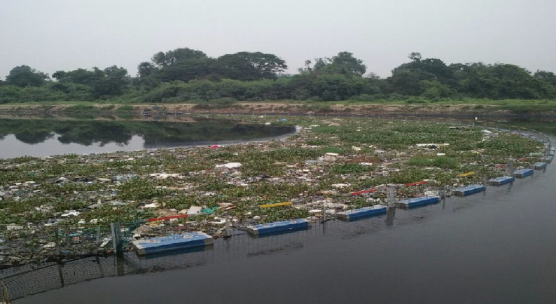 Floating trash barrier for river and lake cleanup